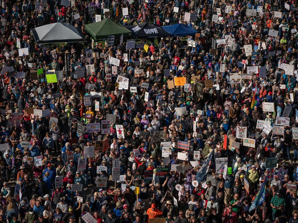 “No Kings” demonstrators on Saturday in front of the Idaho State Capitol in Boise. Thousands of rallies of varying sizes were held across the country. Credit...Loren Elliott for The New York Times