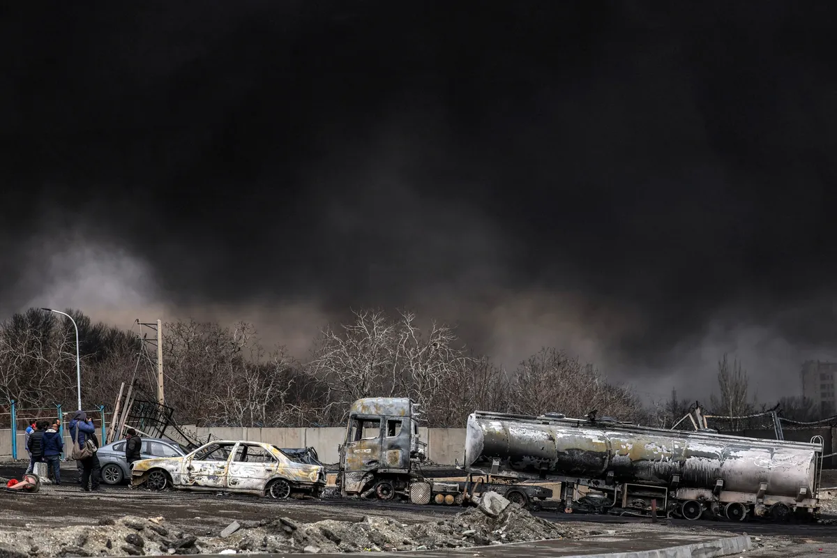 A dark smoke cloud near a strike on the Shahran oil refinery in Tehran.Source: AFP/Getty Images