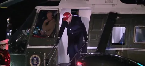Trump gripping handrails
