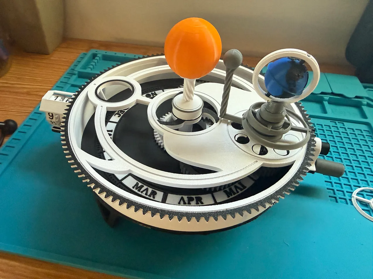 A working Orrery 3D printed by my 12-year-old son
