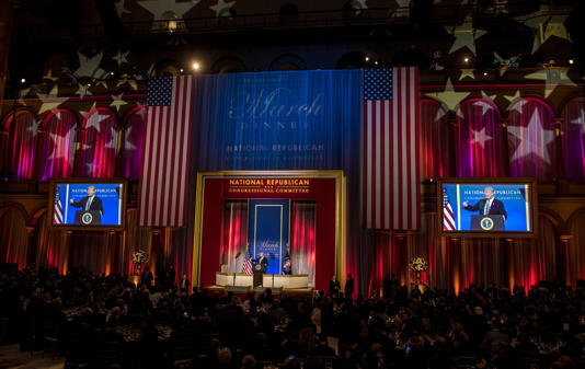 President Donald Trump delivers remarks at the National Republican Congressional Committee March Dinner at the National Building Museum in 2018. / Pool / Getty Images