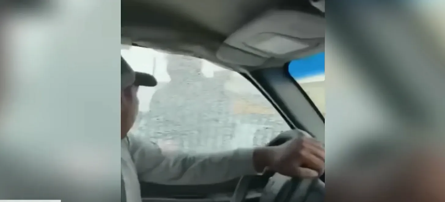 Screen grab of a video in which federal agents shatter the window of Francisco Longoria