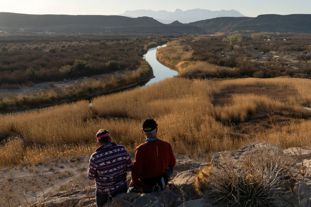 Visitors at Texas' Big Bend National Park look toward the Rio Grande separating Mexico and the United States on Feb. 22, 2025. REUTERS/Cheney Orr