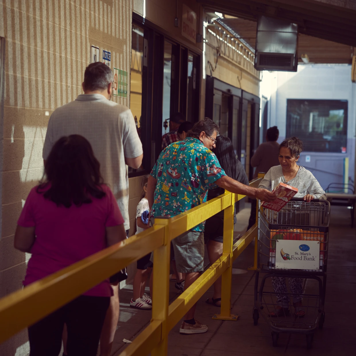 St. Mary’s Food Bank in Surprise, Ariz., drew hundreds of people picking up groceries on April 28.Jesse Rieser for NBC News