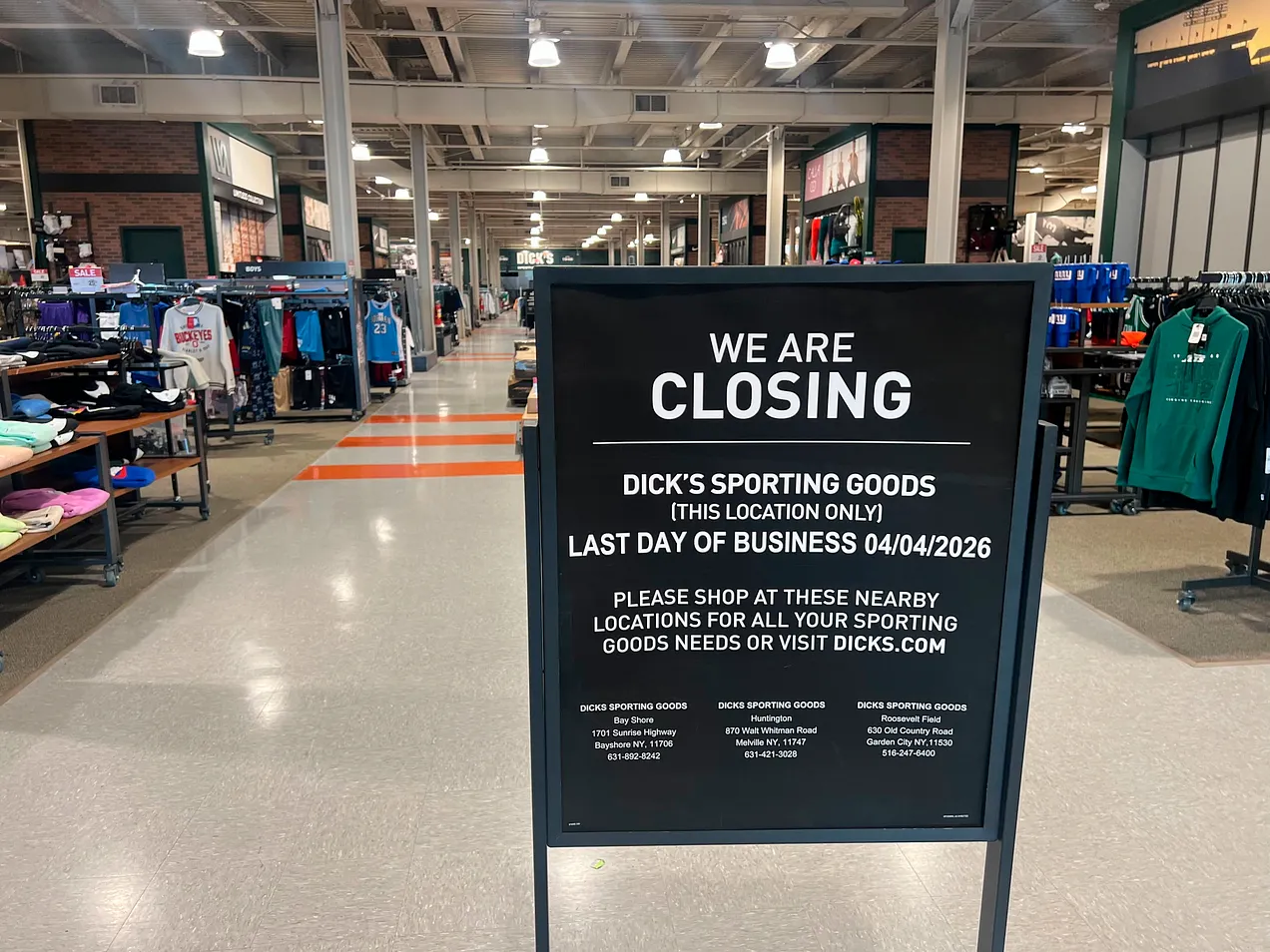 A “we are closing” sign in a Dick’s Sporting Goods in Massapequa, New York, in March. (Tara Conry-Berghorn/Newsday RM via Getty)