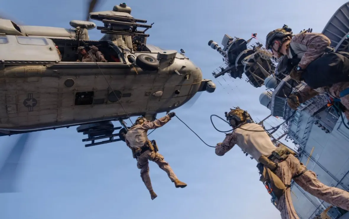U.S. Marines rappel out of a Sea Hawk in support of a U.S. blockade against Iran in the Hormuz Strait (via Centcom)