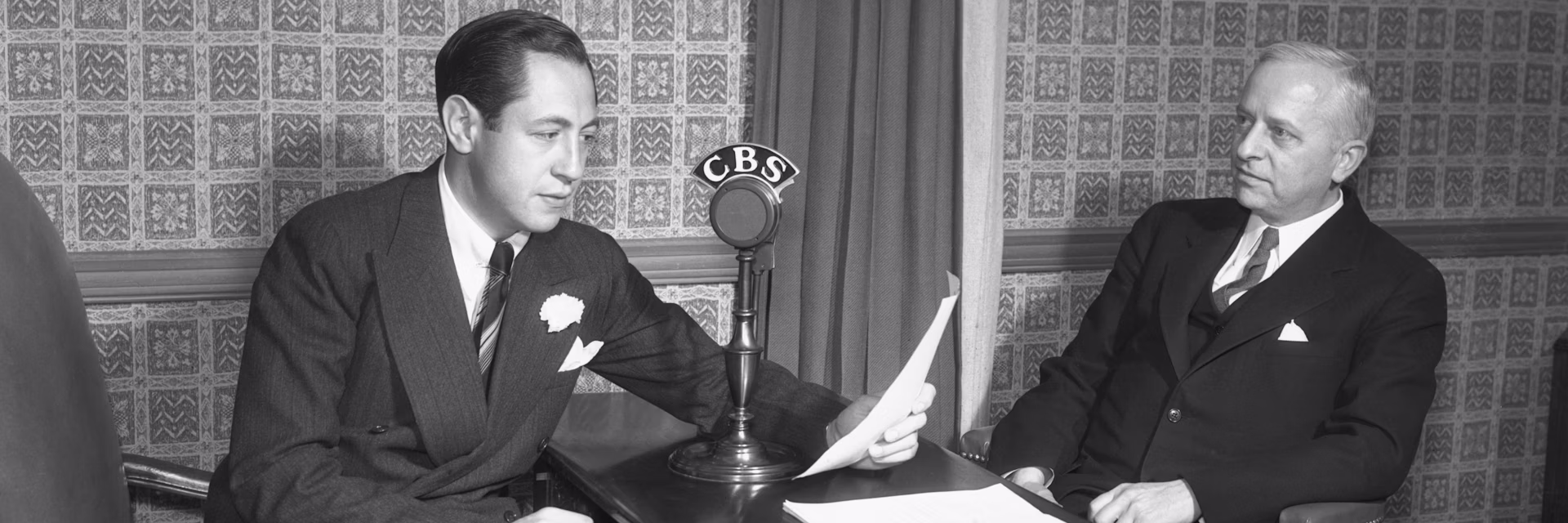 Former CBS President William S. Paley, left, who once called broadcasting ‘an instrument of American democracy,’ speaks on his radio network in 1934. Bettmann/Getty Images