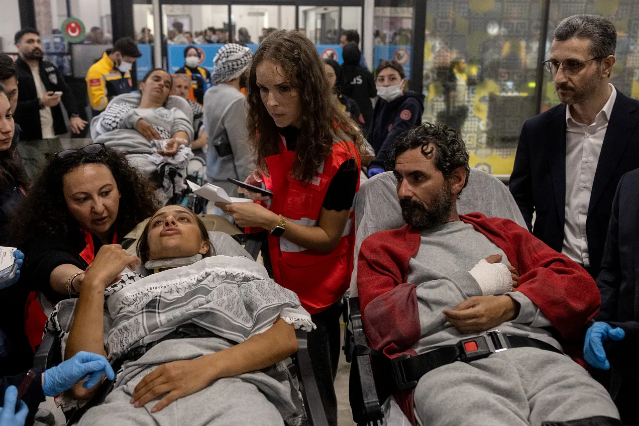 Activists from the Gaza-bound Global Sumud Flotilla injured in Israeli custody arrive in Istanbul after being released on May 21, 2026. Photo by Burak Kara/Getty Images