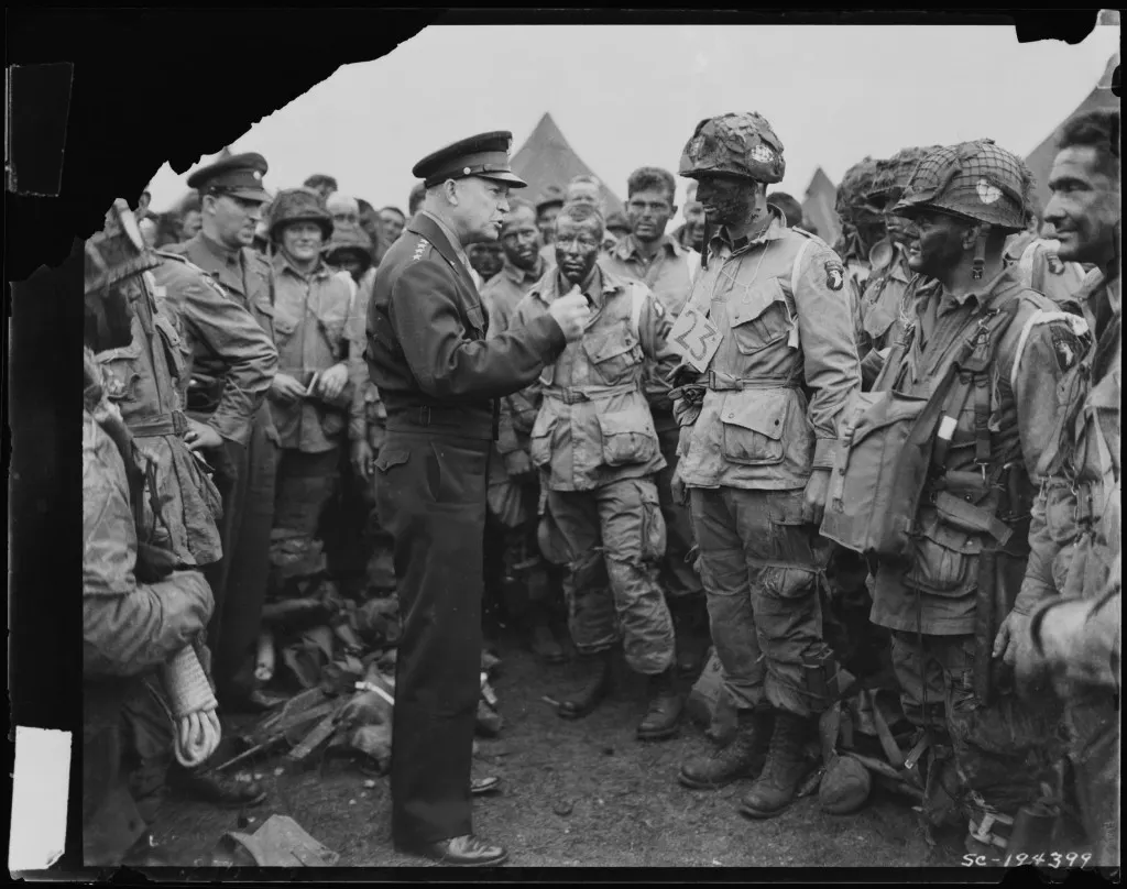 General Eisenhower speaks with members of the 101st Airborne before D-Day General Eisenhower speaks with members of the 101st Airborne before D-Day