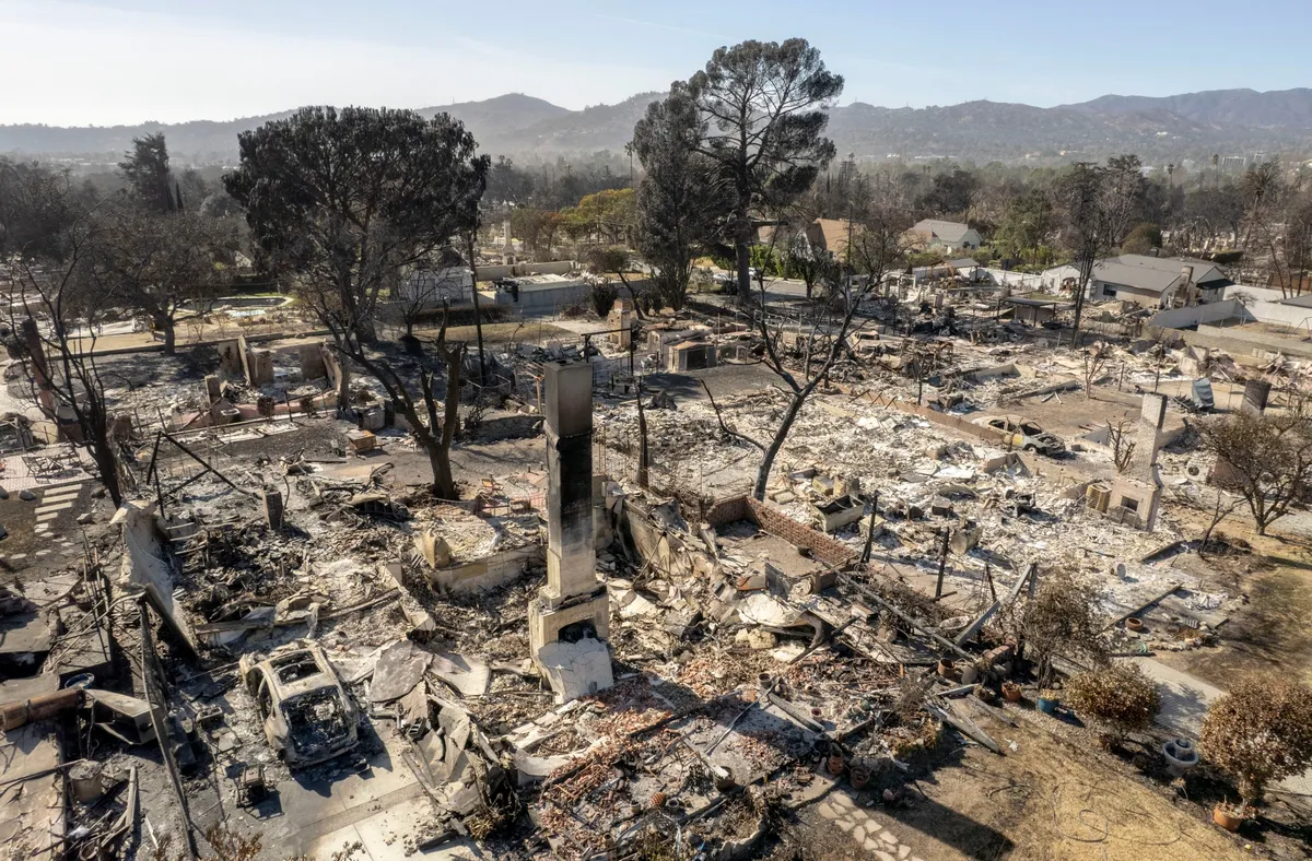 Homes destroyed by the Eaton Fire in Altadena, California, US, on Monday, Jan. 20, 2025. Hurricane-strength gusts from Santa Ana winds will sweep over the mountains and foothills around Los Angeles, putting the region back on high alert after two weeks of devastating fires.Photographer: Kyle Grillot/Bloomberg