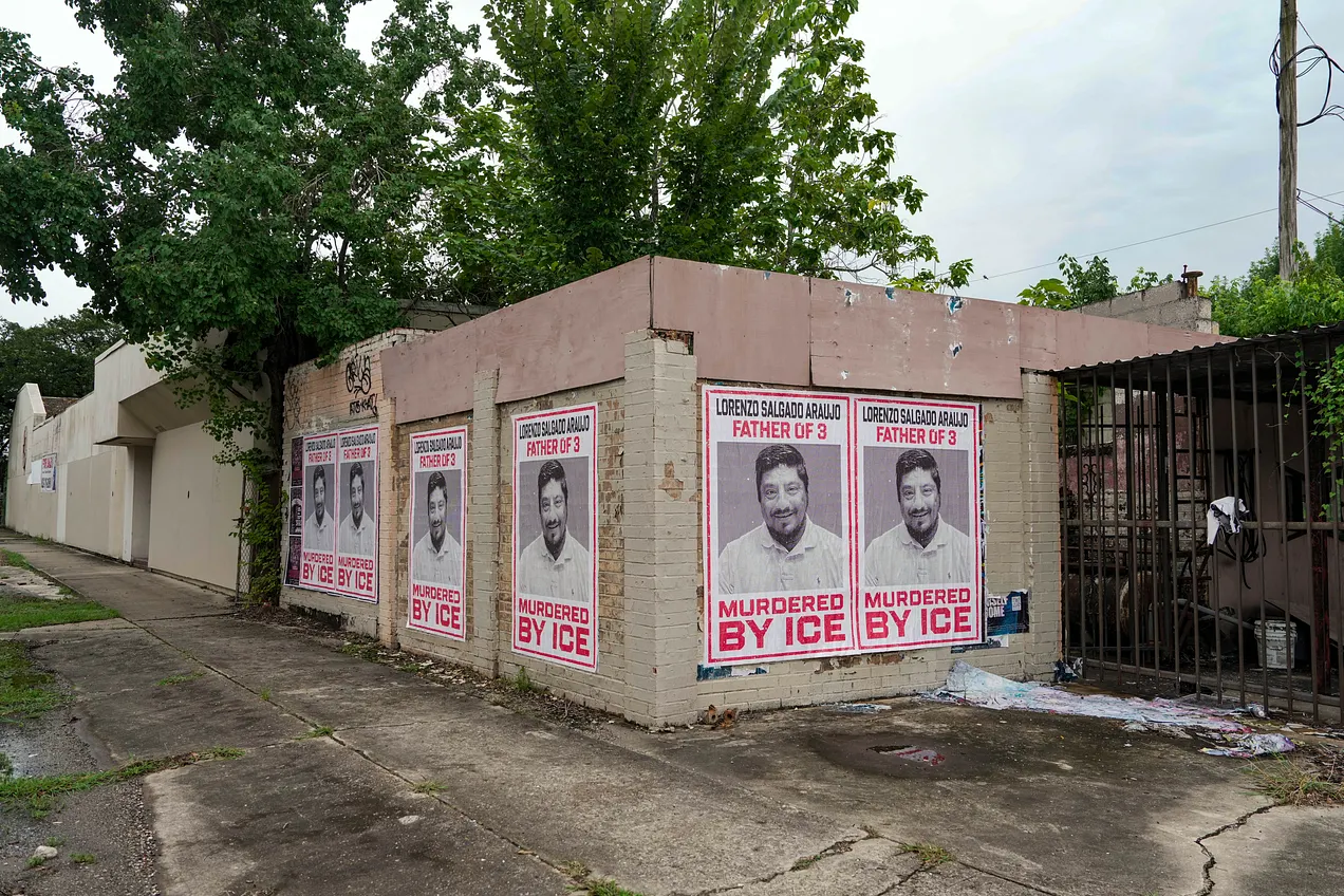 Posters featuring a photo of Lorenzo Salgado Araujo pictured in Houston’s second ward on Tuesday. (Raquel Natalicchio/Houston Chron via Getty)