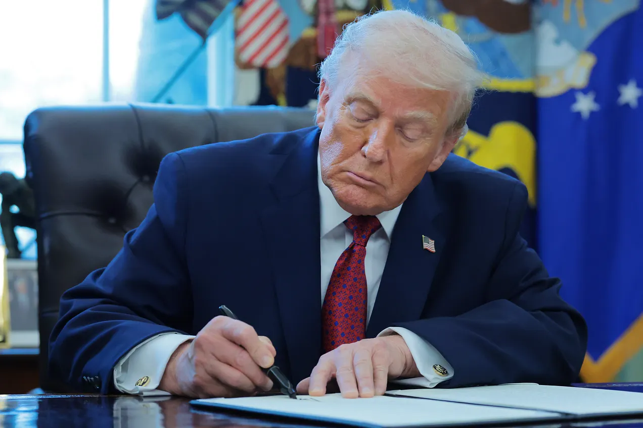 Trump signs an executive order classifying fentanyl as a ‘weapon of mass destruction’ in the Oval Office on Dec. 15, 2025. Photo by Anna Moneymaker/Getty Images