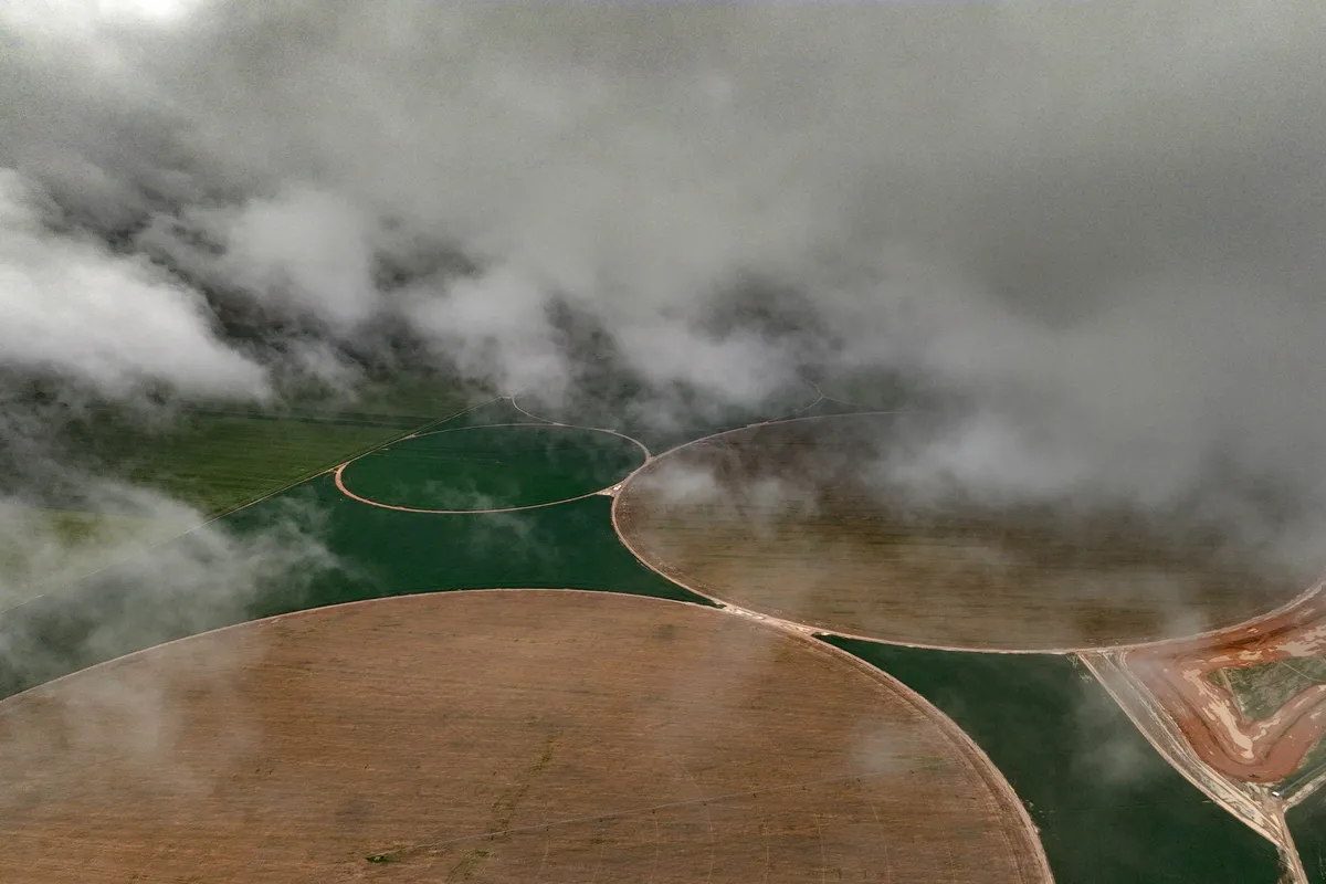 Storm clouds over farmland during a soy and corn harvest near Luis Eduardo Magalhaes, Bahia state, Brazil, on Thursday, March 5, 2026. Photographer: Dado Galdieri/Bloomberg