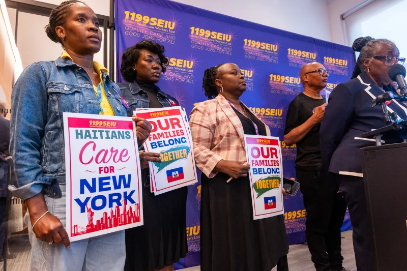 Healthcare workers rally at a Manhattan union headquarters to show support for the Haitian and Syrian communities after the U.S. Supreme Court ruled that the Trump administration could end temporary protected status for potentially millions of foreign nationals from countries experiencing conflict and violence. The decision means that over 330,000 Haitians and Syrians could lose their work authorizations and ability to remain in the country.Spencer Platt/Getty Images