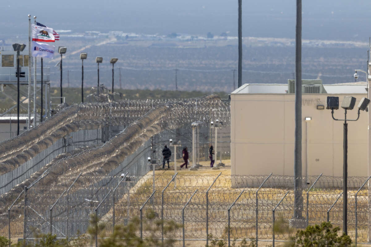 People enter the California City Immigration Processing Center, the state's newest and largest ICE prison, on March 25, 2026 in California City, California.David McNew / Getty Images