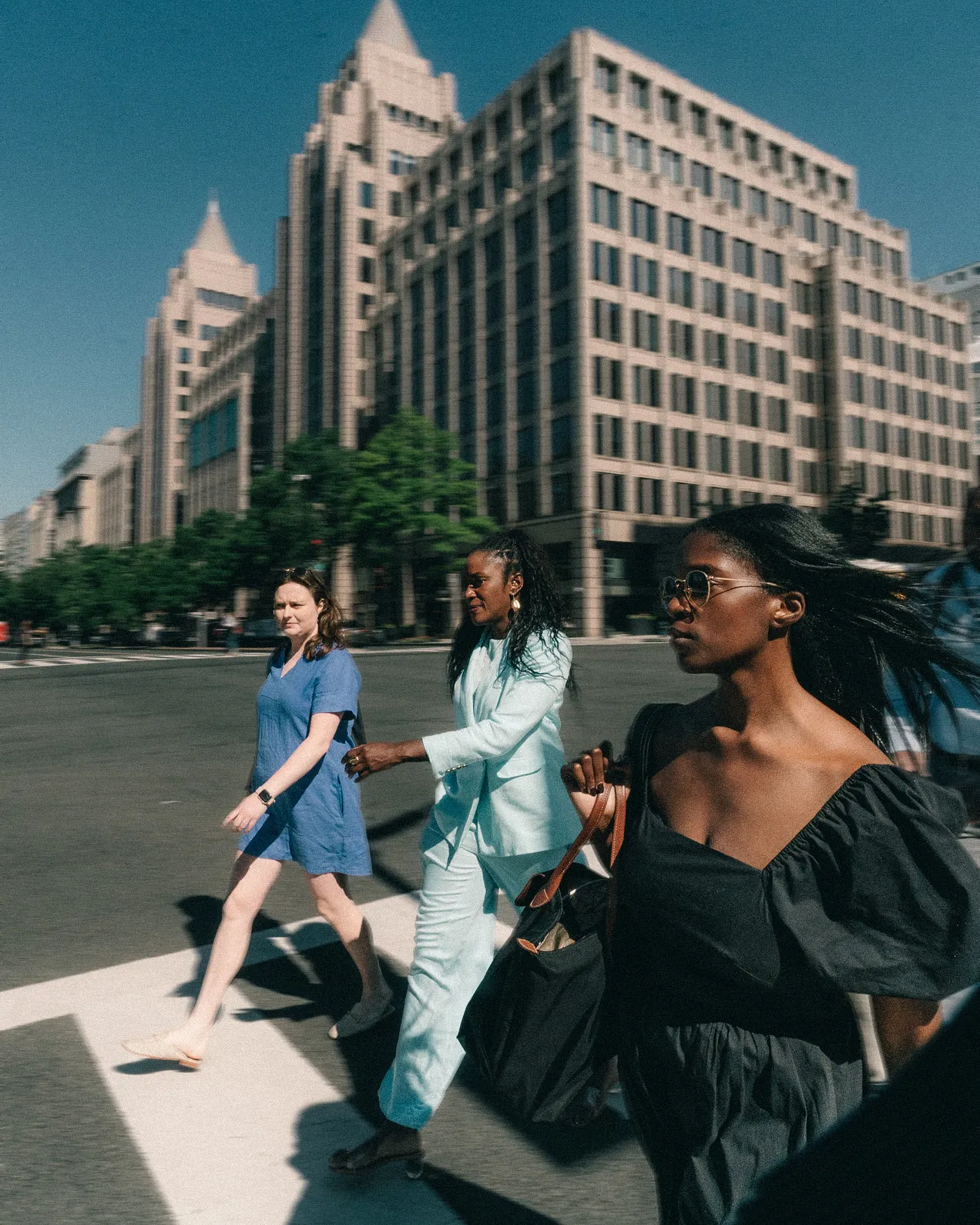 WBNG Comms Chair Kathleen Floyd, Me, and Morenike Moroof-Mustapha, Walking to arbitration in front of the Washington Post building: June 4th 2026. Photo by Ethan Wong.