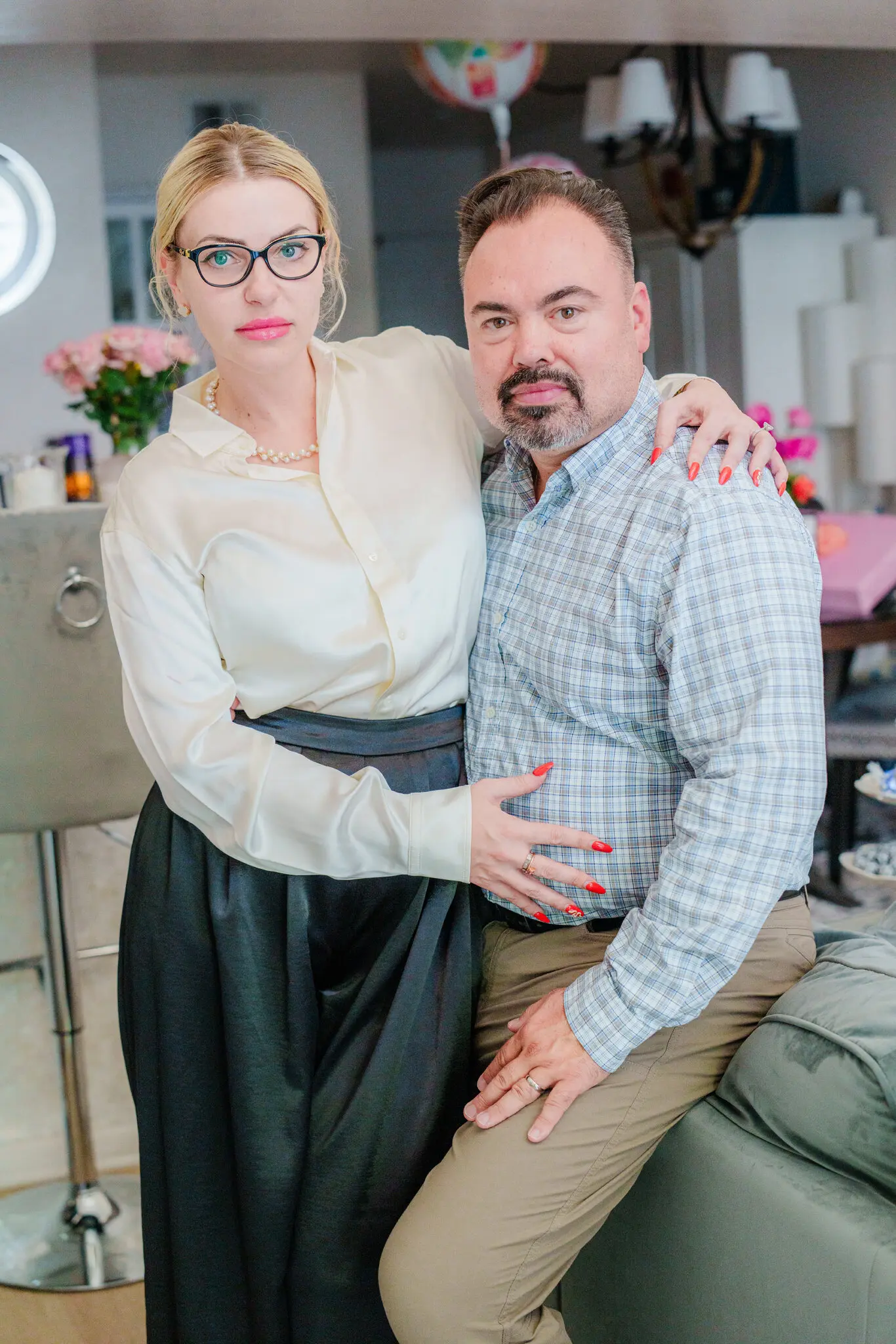 Galina Bobreneva and her husband, Brent Jindra, at their home in Redwood City, Calif.Credit...Gabriela Bhaskar/The New York Times