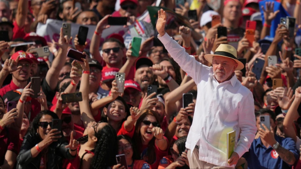 Brazilian President Luiz Inacio Lula da Silva with supporters at a rally on Aug. 16. Lula is being targeted by the Trump administration, as Brazil is one of the few countries in the region not currently aligned with or controlled by Washington. | Andre Penner / AP