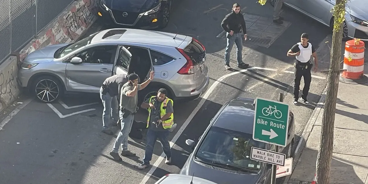 Aftermath of an ICE shooting in New York City, where agents dressed as construction workers fired at a car with a child in it. Aftermath of an ICE shooting in New York City, where agents dressed as construction workers fired at a car with a child in it.