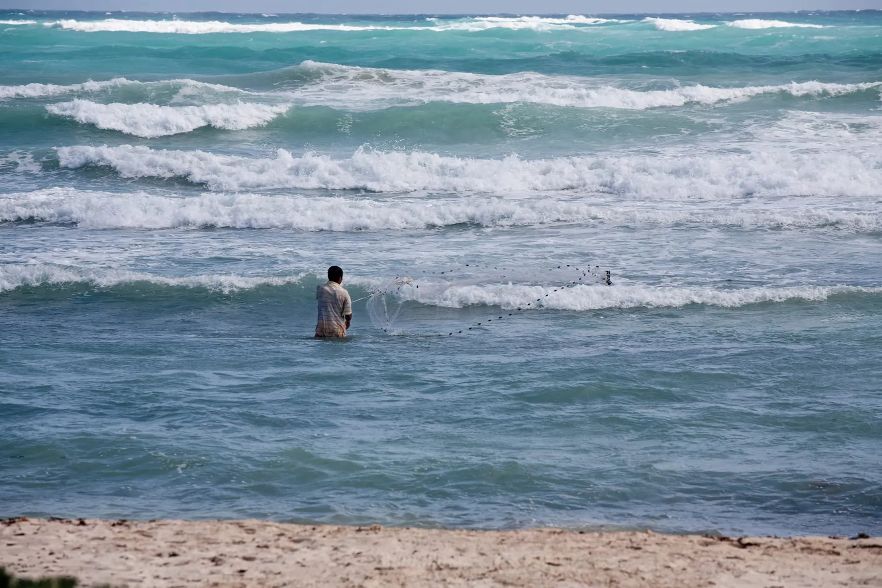 If reef ecosystems change beyond recognition, many people who depend upon the ocean, such as this fisher in Mexico, face paying a high price (Marshall Ikonography/Alamy)