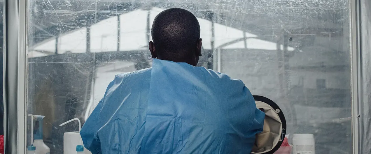 practitioner with Ebola protection